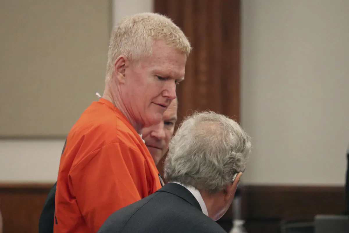 Convicted murderer Alex Murdaugh speaks with his defense attorney, Dick Harpootlian, in Beaufort, S.C. on Friday, Nov. 17, 2023. (James Pollard/AP Photo)