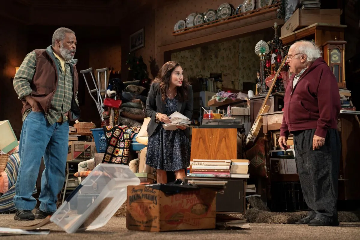 (L–R) Foster (Ray Anthony Thomas), Amelia (Lucy DeVito, DeVito's real-life daughter), and Sam (Danny DeVito), who hasn't stepped outside of his home in close to three years. (Joan Marcus)