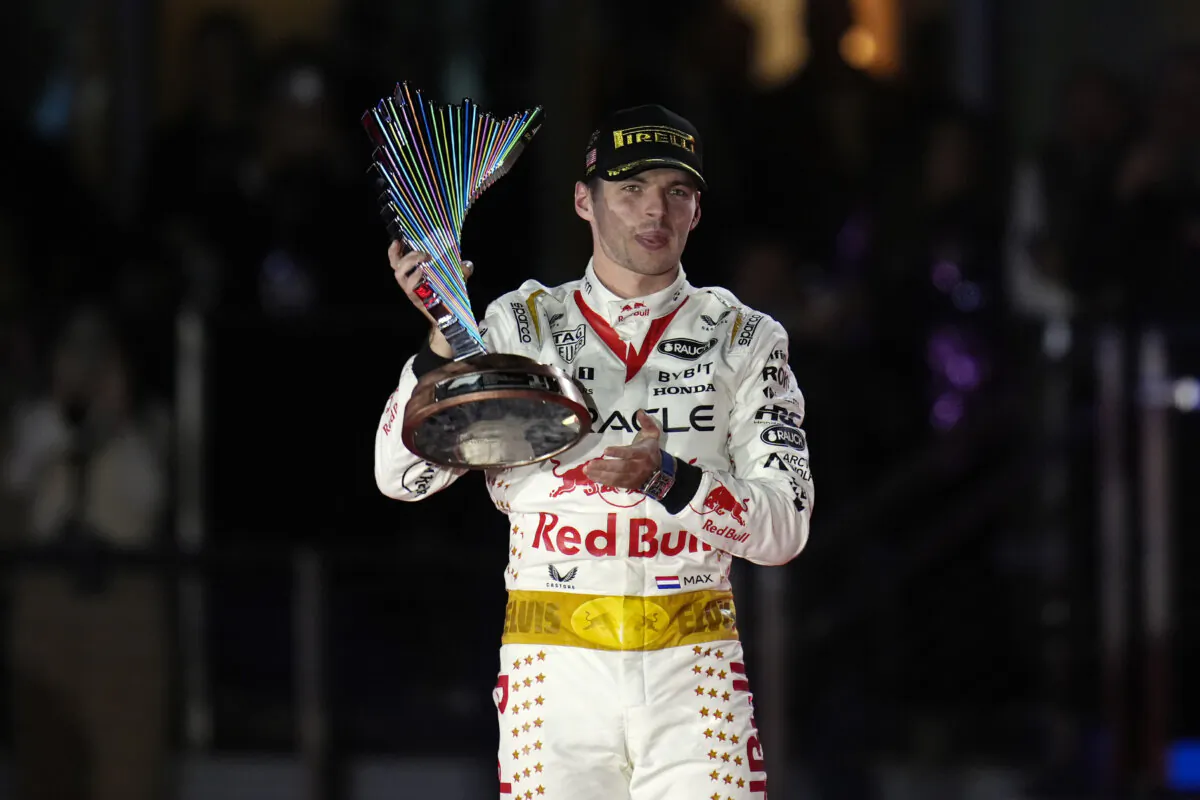 Red Bull driver Max Verstappen, of the Netherlands, holds a trophy after winning the Formula One Las Vegas Grand Prix auto race in Las Vegas on Nov. 19, 2023. (Nick Didlick/AP Photo)