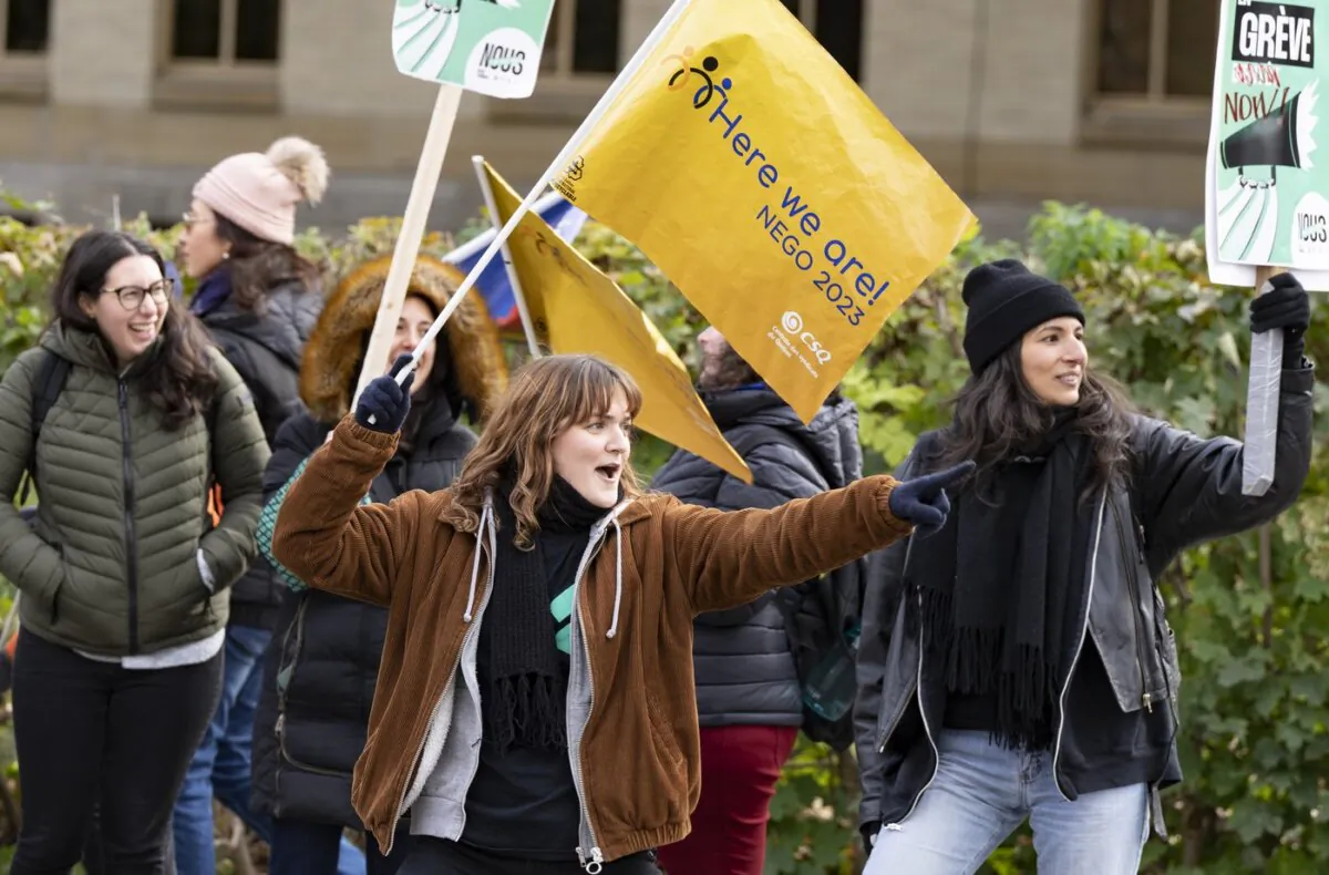 Quebec public sector workers in health, education and social services hold a one-day strike in Montreal, on Nov. 6, 2023. (The Canadian Press/Christinne Muschi)