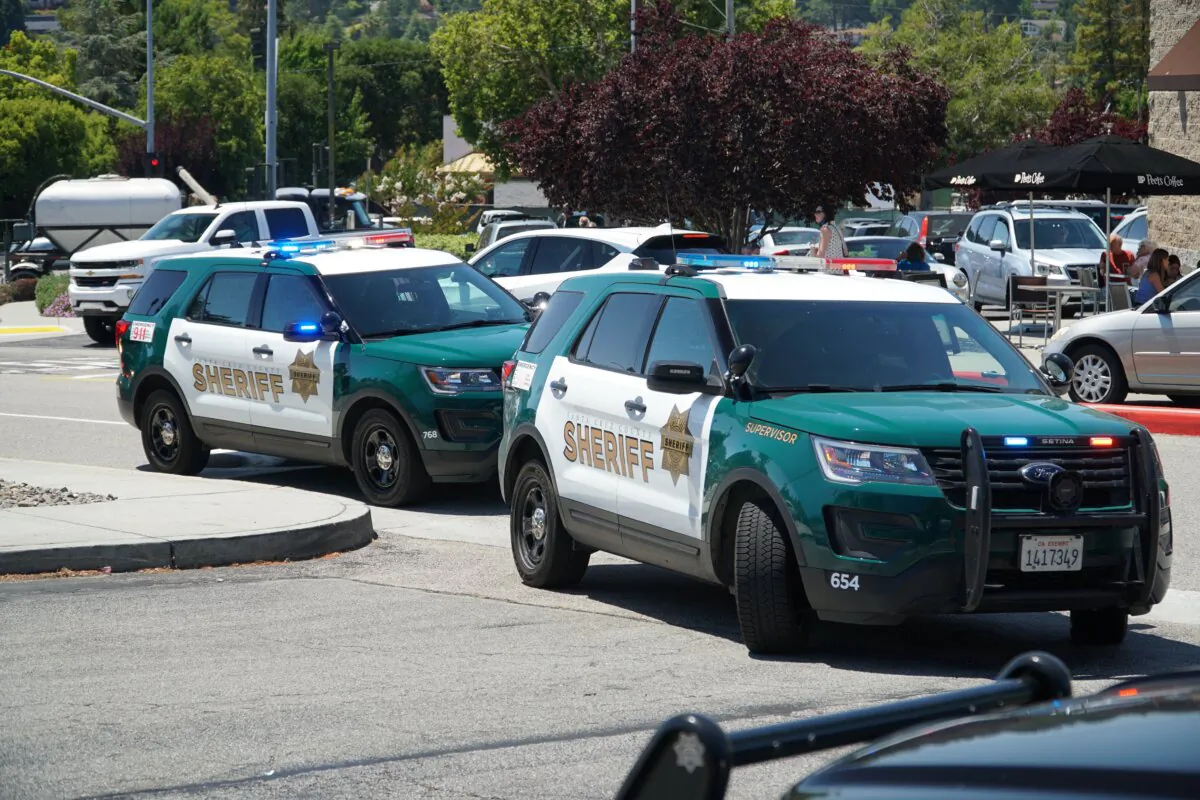 Two Santa Cruz County Sheriff's cars in Scotts Valley, Calif., on Aug. 11, 2021. (Michael Barajas/Shutterstock)