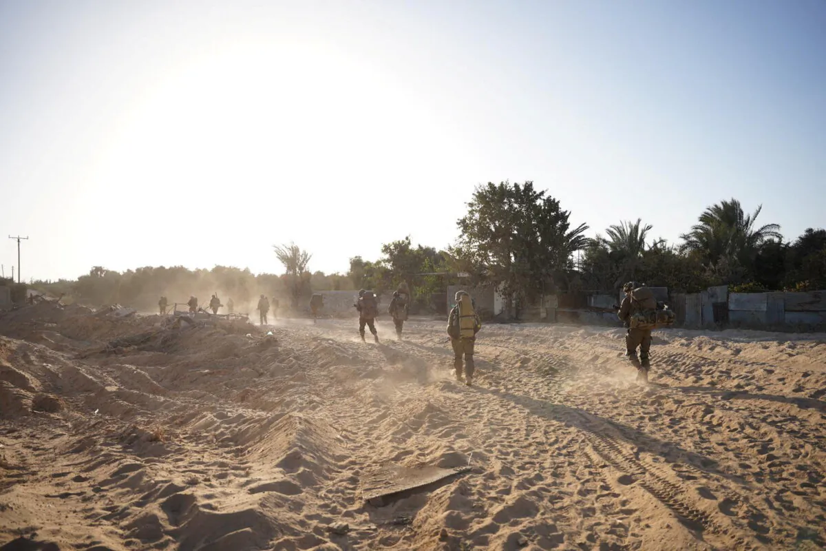 A handout image shows what the Israeli army says is a soldier operating in a location given as Gaza, amid the ongoing ground operation of the Israeli army against the Hamas terrorist group, released on Nov. 19, 2023. (Israeli Army/Handout via Reuters)