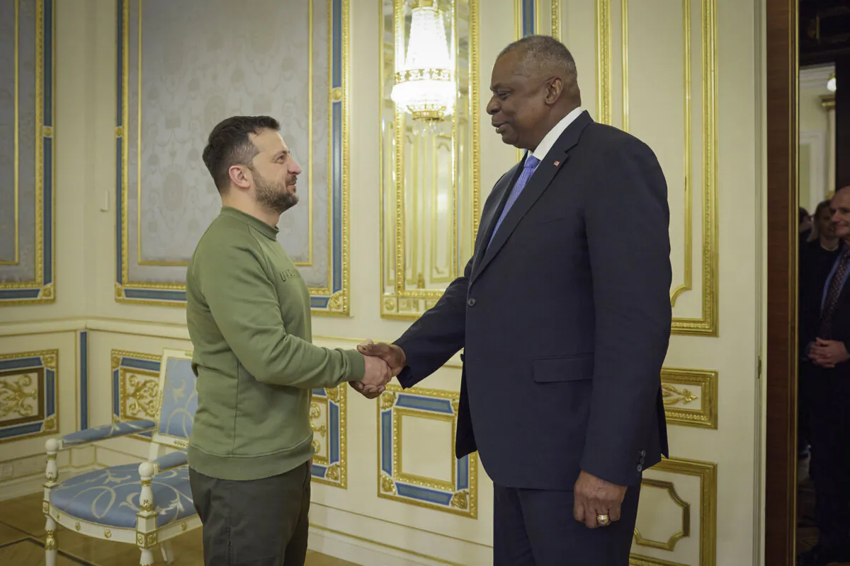 Ukrainian President Volodymyr Zelenskyy (L) shakes hands with U.S. Secretary of Defense Lloyd Austin in Kyiv, Ukraine, on Nov. 20, 2023. (Ukrainian Presidential Press Office via AP)