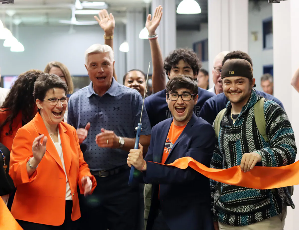 Djean Nikitov (C) cuts the ribbon to celebrate the grand opening of the new student lounge on SUNY Orange campus in Middletown, N.Y., on Aug. 28, 2023. (Courtesy of SUNY Orange)