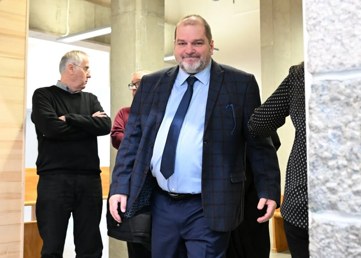 Former Parti Québécois MNA Harold LeBel walks to the courtroom after a break at the courthouse, in Rimouski, Que., on Nov. 14, 2022. (The Canadian Press/Jacques Boissinot)