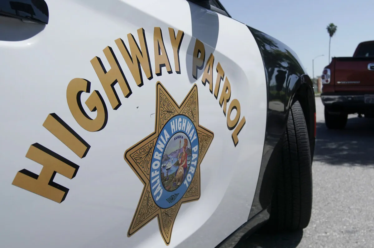 A California Highway Patrol officer stops a motorist in Anaheim, Calif., on April 23, 2020. (Chris Carlson/AP Photo)