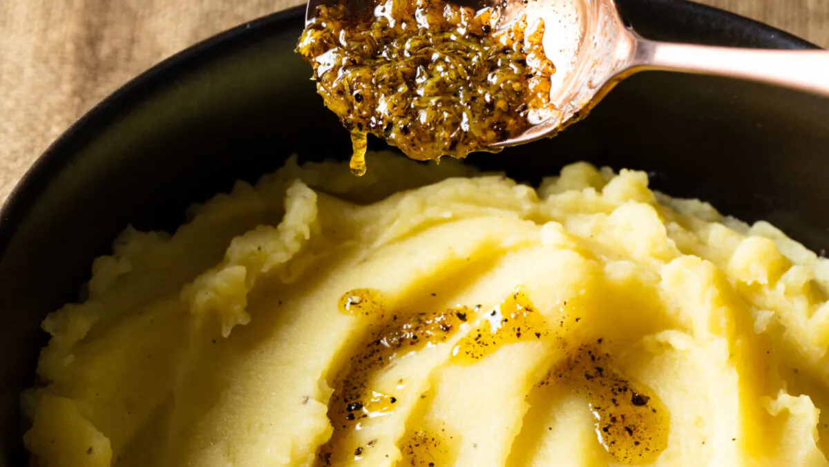 Top the mashed potatoes with extra olive oil, lemon zest, and black pepper. (Steve Klise/TNS)