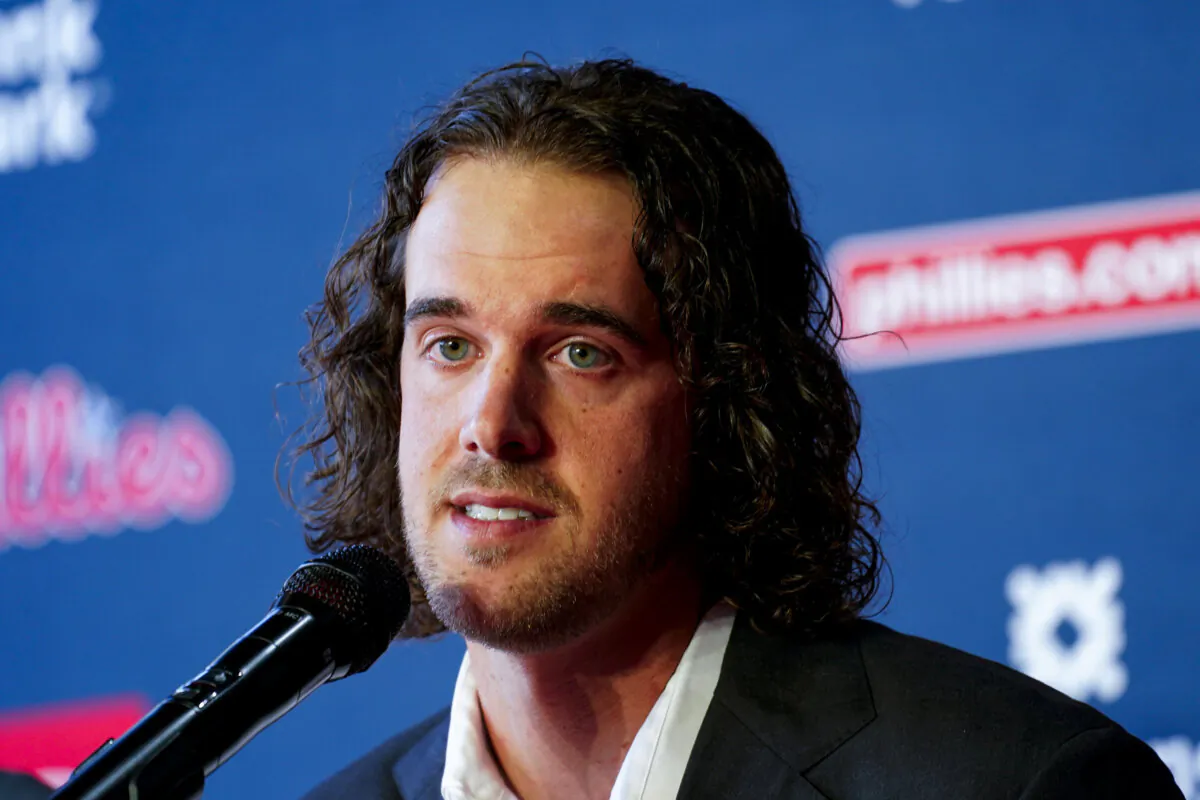 Philadelphia Phillies baseball team pitcher Aaron Nola takes questions from the media after signing a seven-year contract in Philadelphia on Nov. 20, 2023. (Chris Szagola/AP Photo)