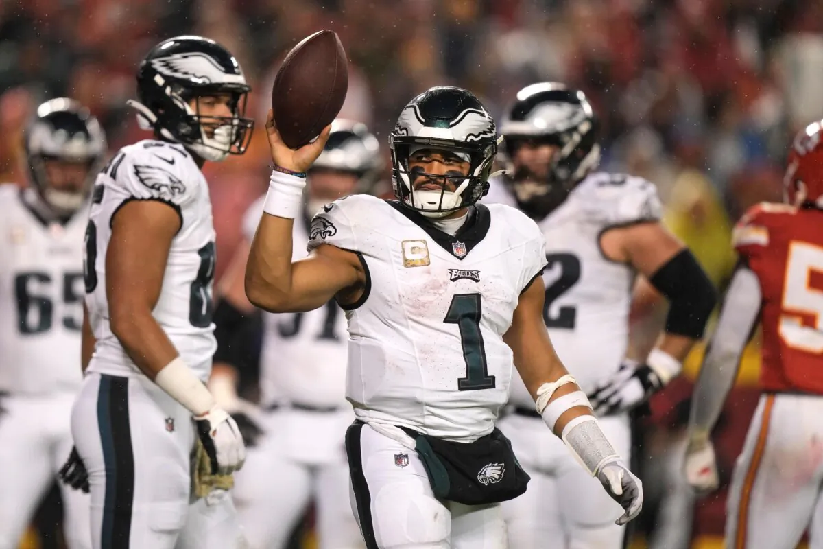 Philadelphia Eagles quarterback Jalen Hurts celebrates after scoring on a 1-yard run during the second half of an NFL football game against the Kansas City Chiefs in Kansas City, Mo., on Nov. 20, 2023. (Charlie Riedel/AP Photo)