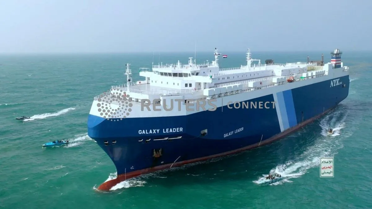 The Galaxy Leader cargo ship is escorted by Houthi boats in the Red Sea in on Nov. 20, 2023. (Houthi Military Media/Handout via Reuters)