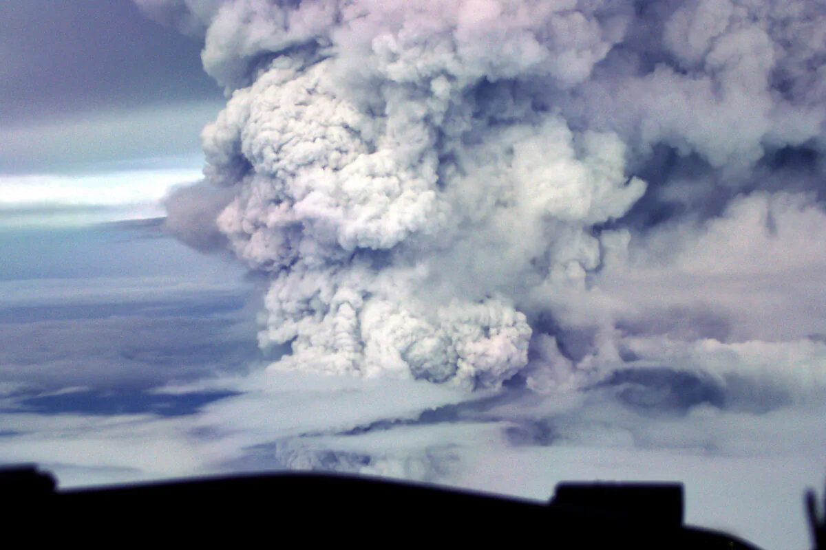 A cloud of volcanic ash and steam rises as Mount Ulawun erupts on April 30, 2001, seen from 30,000 feet in the air. (Klaus Wermuth/AAP Image via AP)