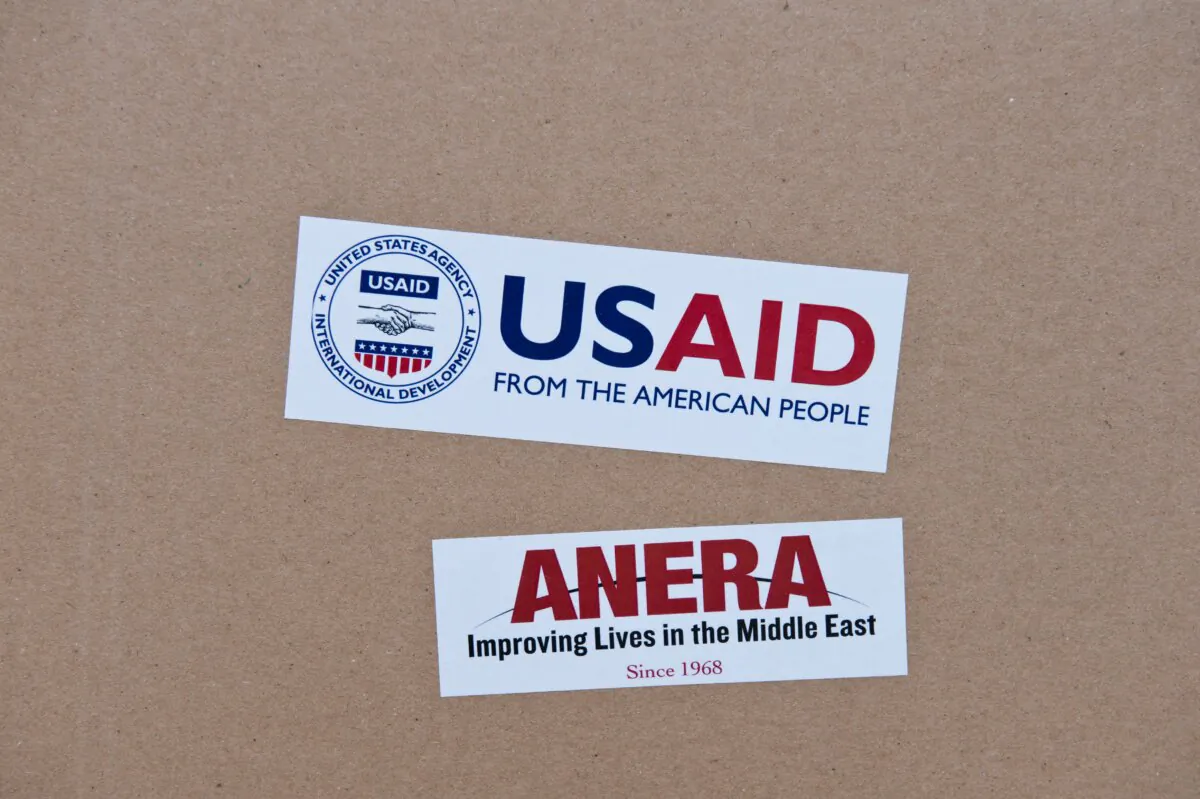 A box containing sanitation kits and soap provided by the United States Agency for International Development (USAID) being stored at a U.N. school before distribution to displaced Palestinians in Gaza City on Aug. 15, 2014. (Roberto Schmidt/AFP via Getty Images)
