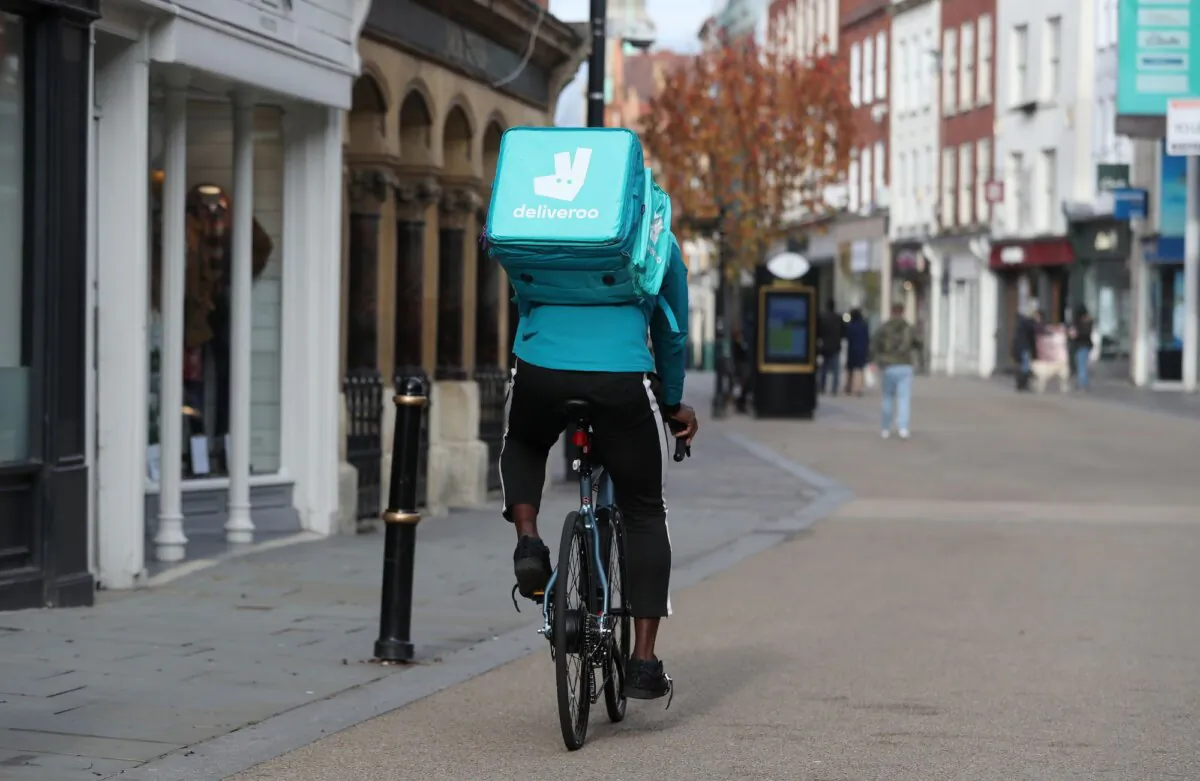 A Deliveroo rider on his bicycle in London on Nov. 5, 2020. (PA)