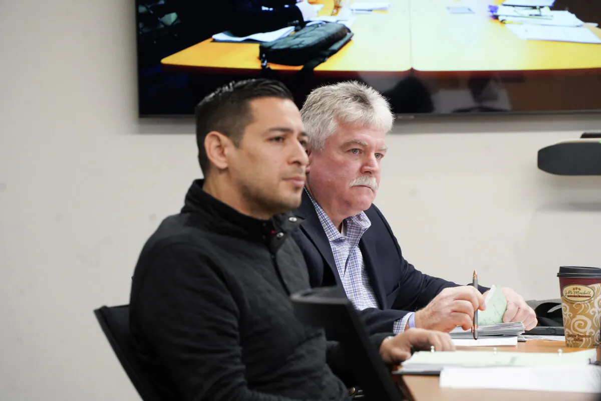 Orange County Legislator Kevin Hines (R) and Kevindaryán Luján at a special investigative committee meeting in Goshen, N.Y., on Nov. 21, 2023. (Cara Ding/The Epoch Times)