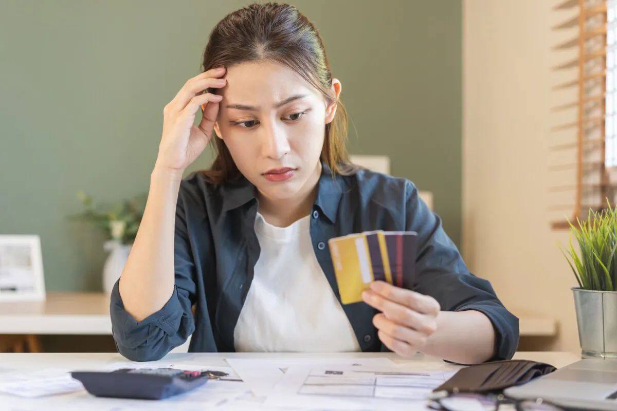Learn to pay off the payments on time and in full. (Kmpzzz/Shutterstock)