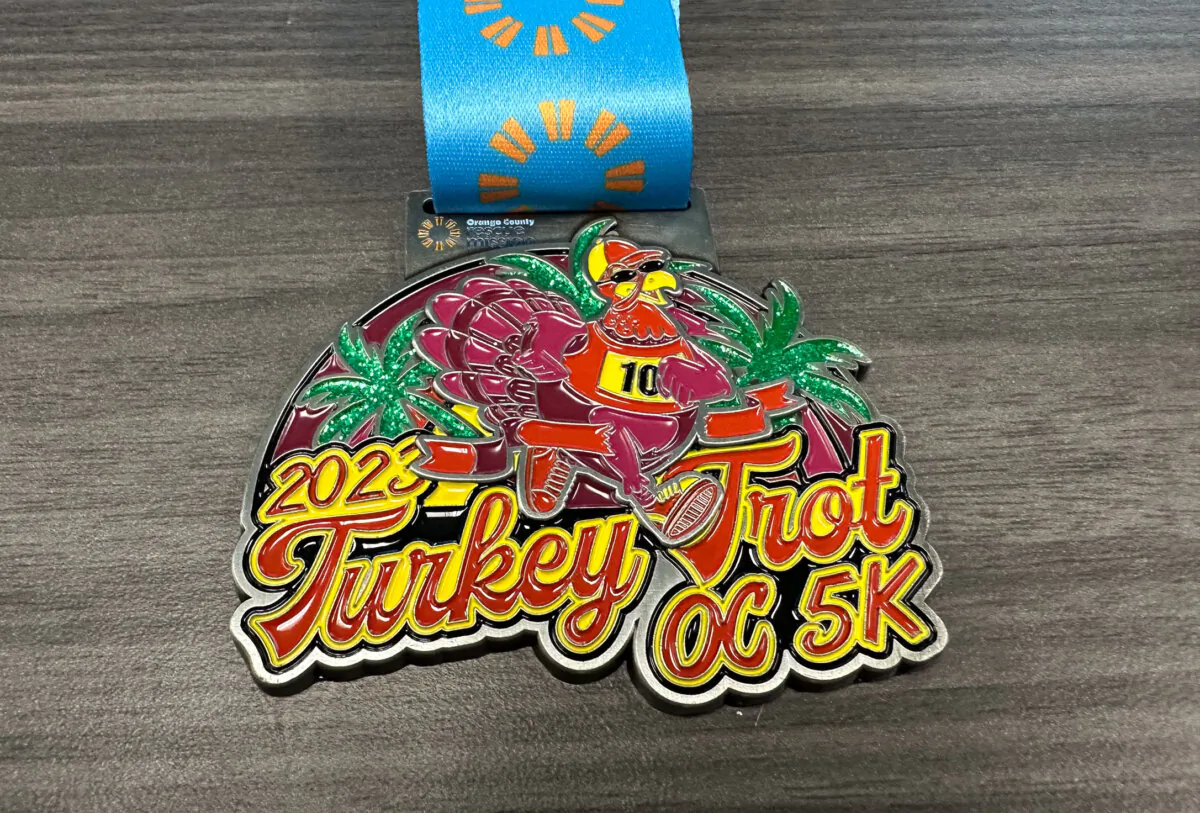 The race medal awarded to runners of the now canceled 2023 Turkey Trot OC 5k race in Tustin, Calif., on Nov. 20, 2023. (John Fredricks/The Epoch Times)