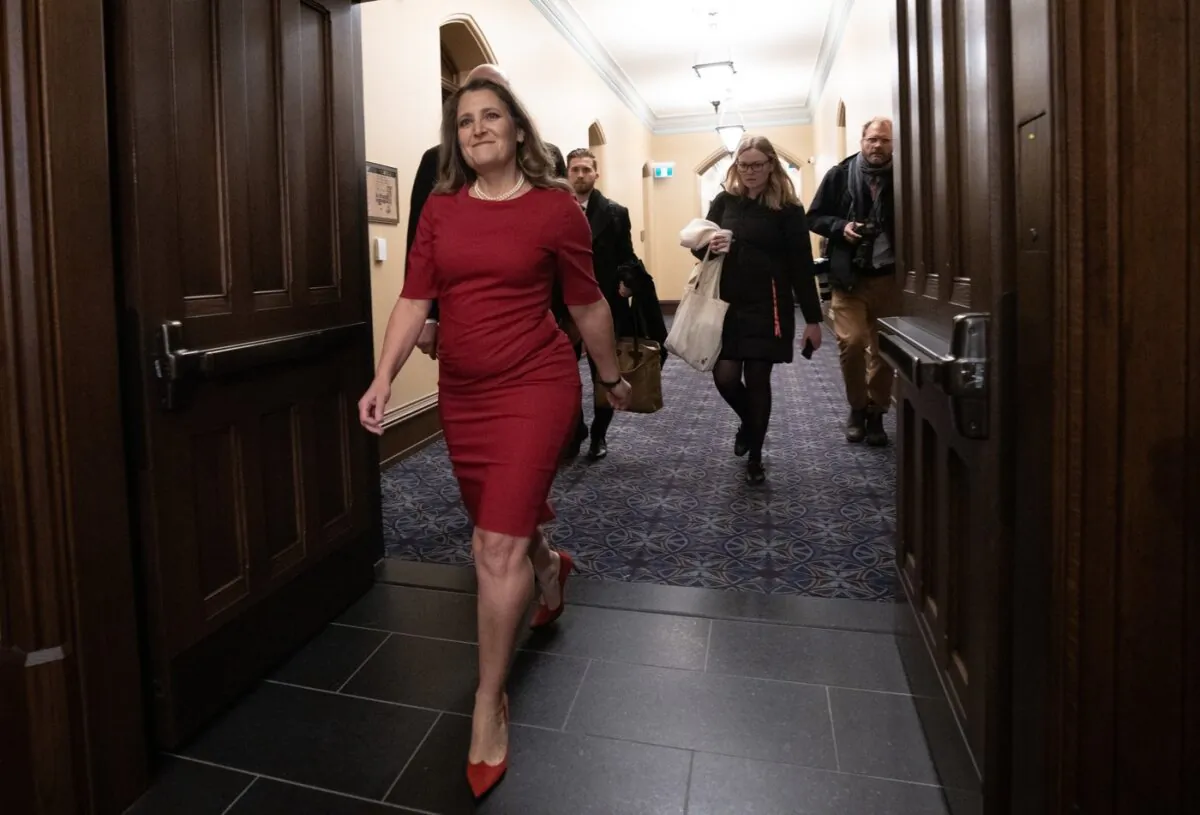 Deputy Prime Minister and Minister of Finance Chrystia Freeland makes her way to a cabinet meeting on Parliament Hill, in Ottawa, on Nov. 21, 2023. (The Canadian Press/Adrian Wyld)