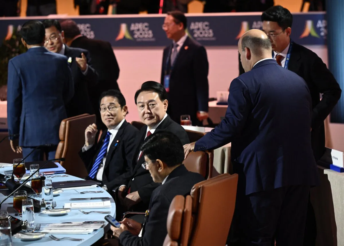 Japanese Prime Minister Fumio Kishida (L) and South Korean President Yoon Suk Yeol look on during the Asia-Pacific Economic Cooperation (APEC) summit in San Francisco, Calif., on Nov. 16, 2023. (Brendan Smialowski/ AFP via Getty Images)