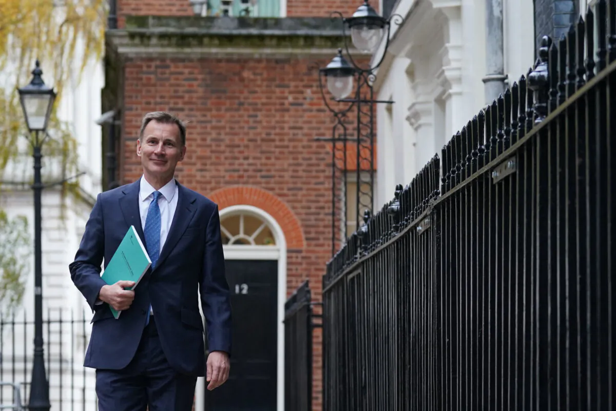 Britain's Chancellor of the Exchequer Jeremy Hunt leaves 11 Downing Street to present his Autumn Budget Statement at the House of Commons in London on Nov. 22, 2023. (Stefan Rousseau/POOL/AFP via Getty Images)
