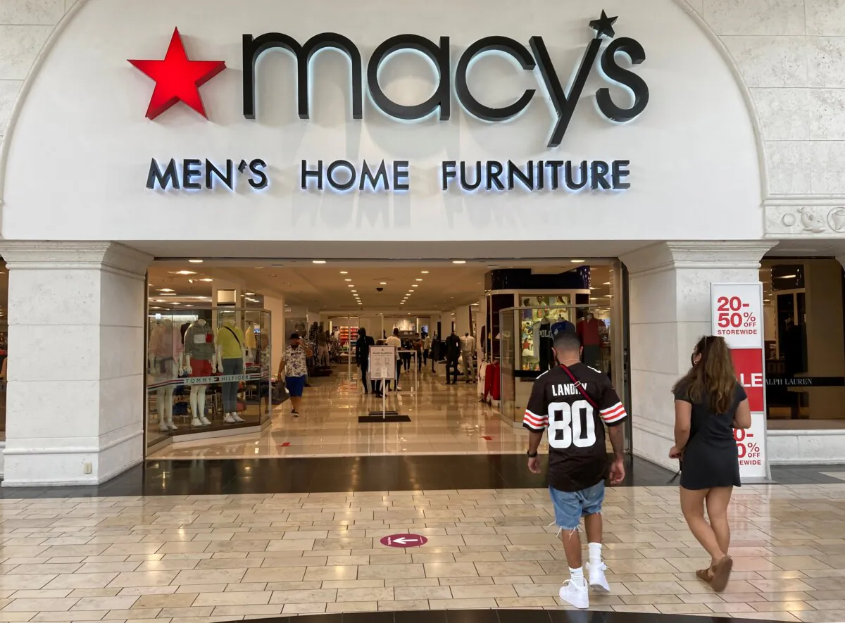 Shoppers walk into a Macy's department store at Miami International Mall in Doral, Fla., on Feb. 22, 2021. (Wilfredo Lee/AP Photo)