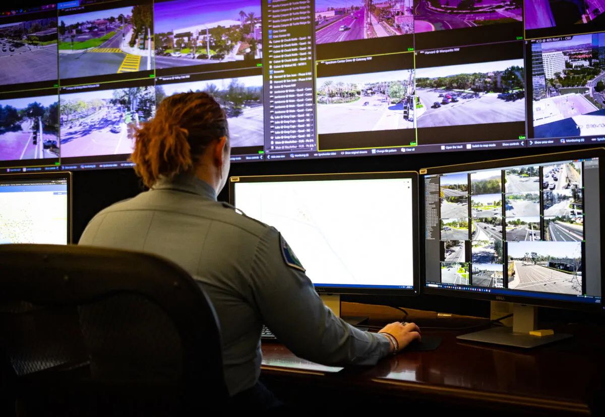 A law enforcement officer monitors surveillance equipment in Irvine, Calif., on Nov. 21, 2023. (John Fredricks/The Epoch Times)