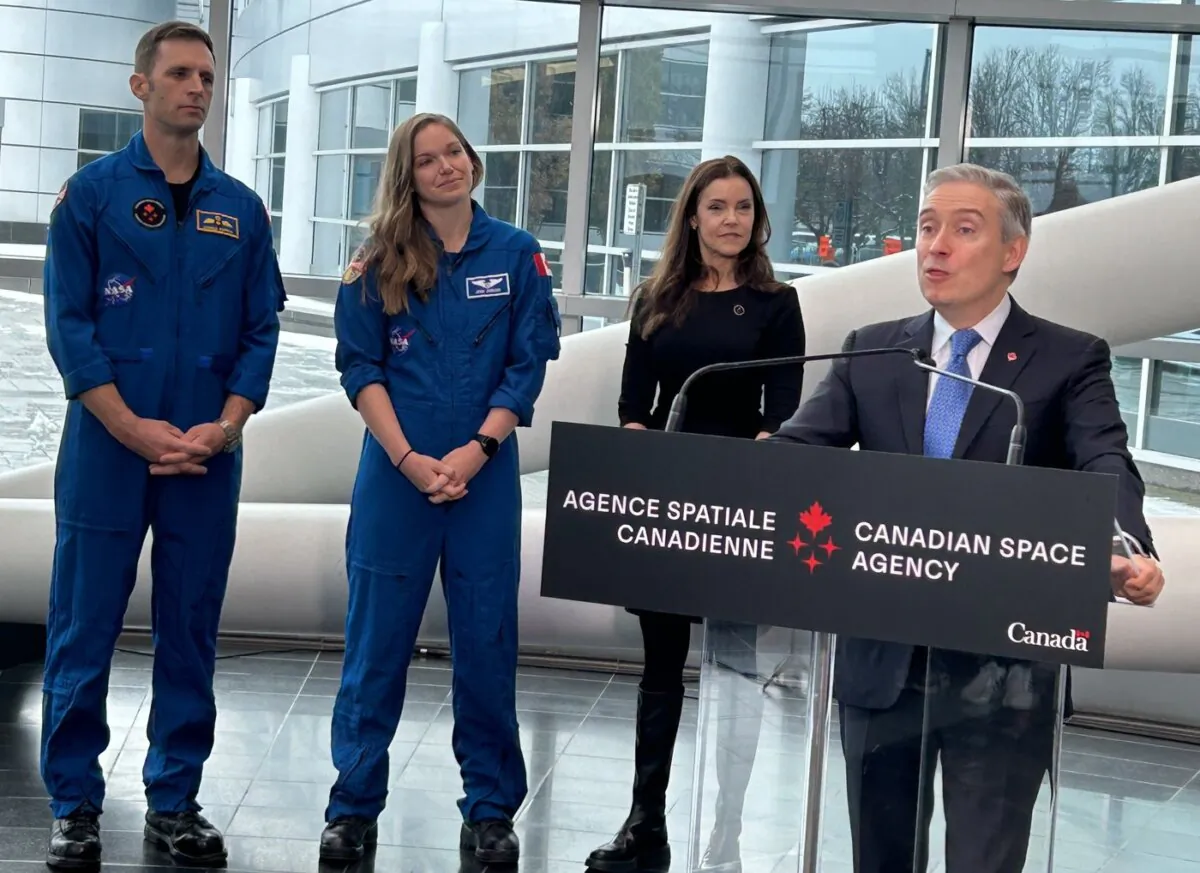 Innovation, Science and Industry Minister Francois-Philippe Champagne makes an announcement as astronauts Joshua Kutryk and Jenni Gibbons, and Canadian Space Agency president Lisa Campbell look on at CSA headquarters in Longueuil, Que., on Nov. 22, 2023. (The Canadian Press/Sidhartha Banerjee)
