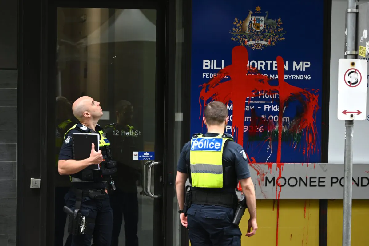 Victoria Police offices leave Bill Shorten's electoral office after it has been vandalised in Melbourne, Australia, on Nov. 23, 2023. (AAP Image/Joel Carrett)