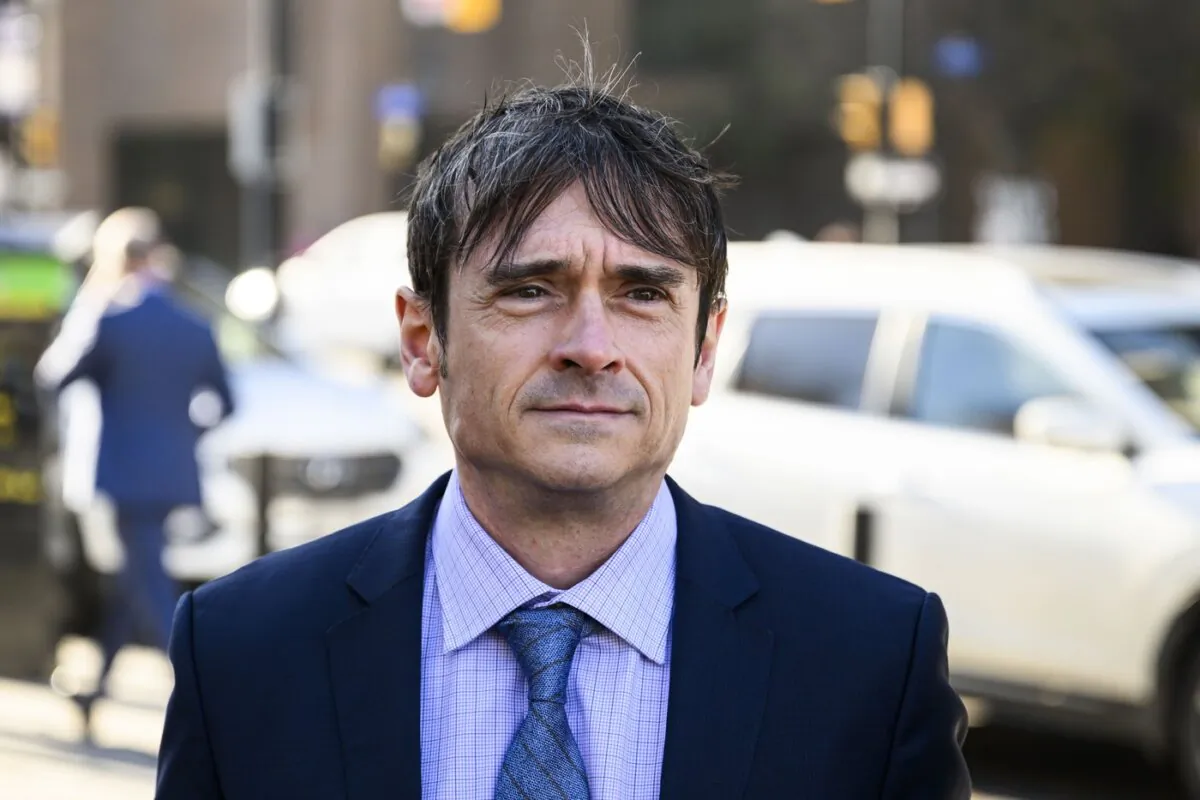 Cameron Jay Ortis, a former RCMP intelligence official charged with breaching Canada's secrets law, arrives for his trial at the courthouse in Ottawa, on Nov. 16, 2023. (The Canadian Press/Justin Tang)