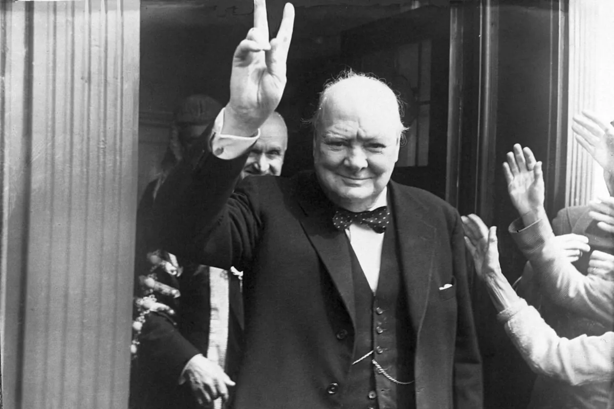 British Prime Minister Winston Churchill (1874–1965) giving his famous wartime V-sign at Dover in 1951. (Central Press/Hulton Archive/Getty Images)
