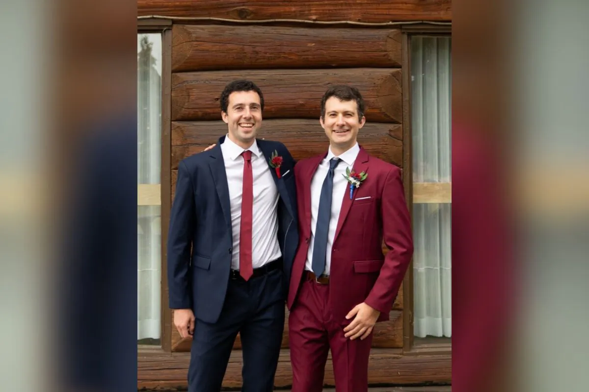 Joshua Mayers (R) is shown in this undated handout image standing with his brother Matt. (The Canadian Press/HO-Mayers Family)