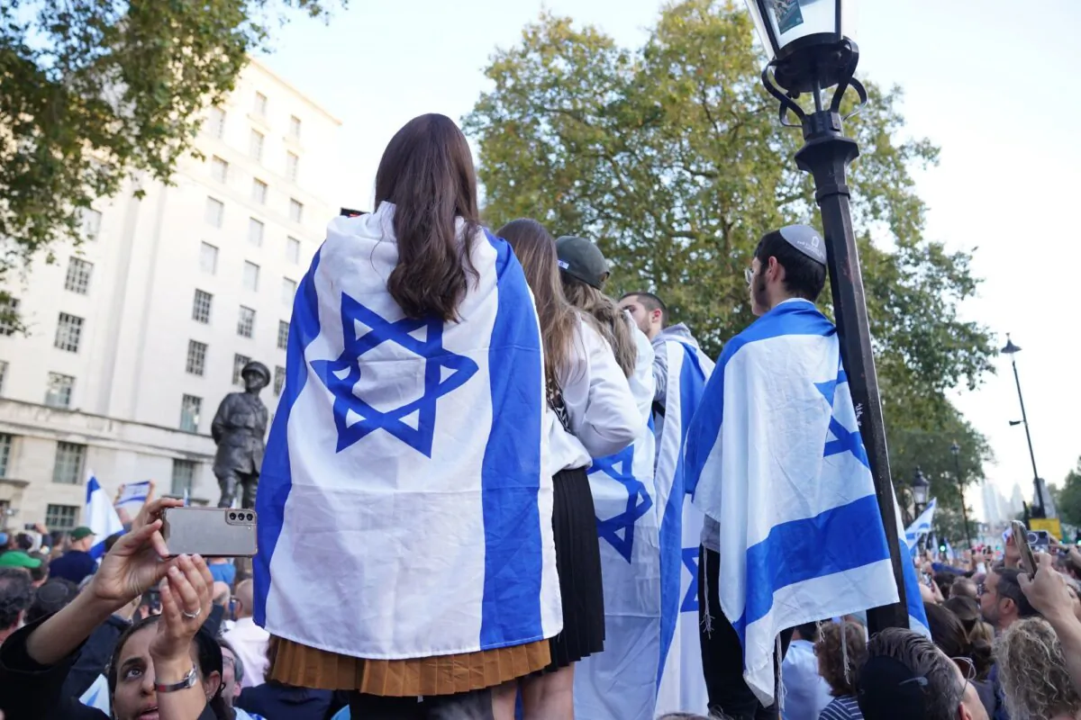 People attending a vigil for the victims of the Hamas attacks in Israel, outside Downing Street in central London on Oct. 9, 2023. (PA)