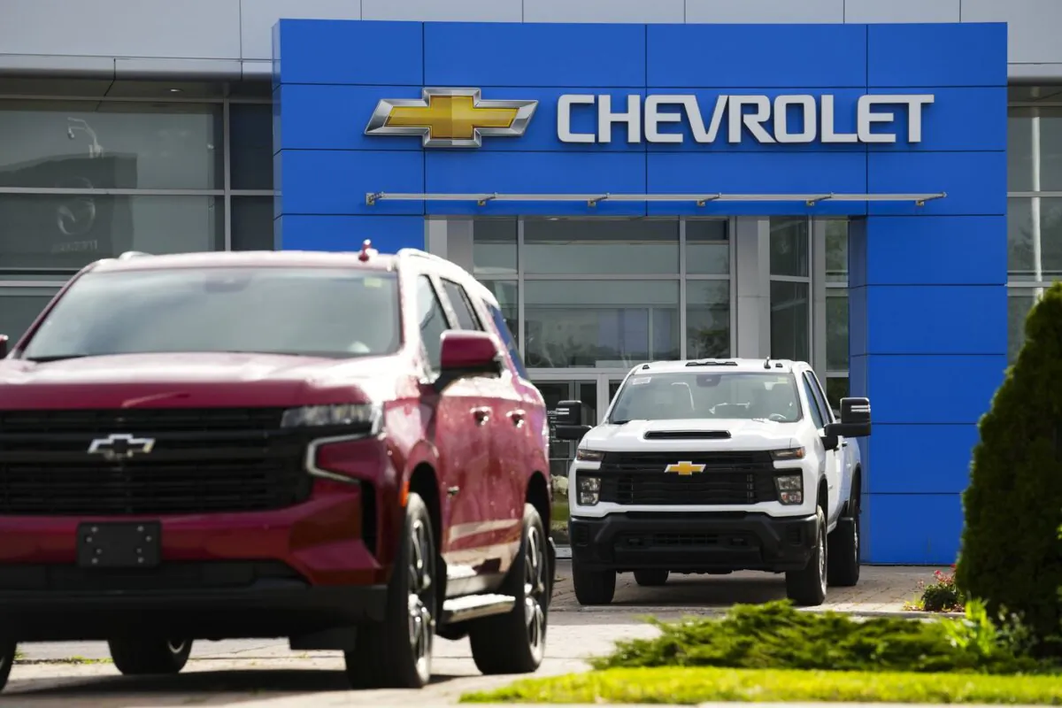 Vehicles are pictured at a Chevrolet dealership in Ottawa on Aug. 11, 2023. (The Canadian Press/Sean Kilpatrick)