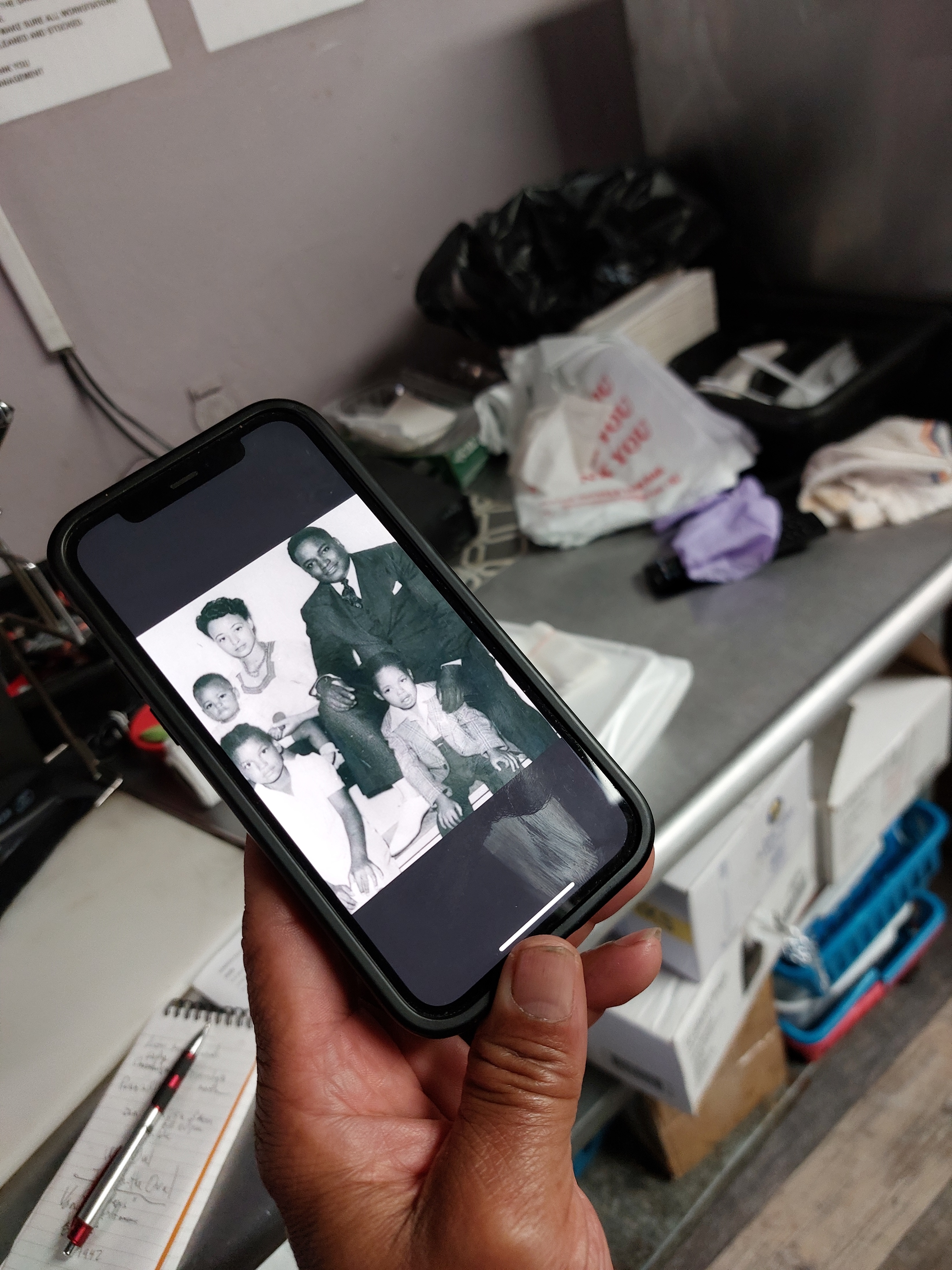 Mr. Vance Whitmore shows an old family photo. (Kevin Revolinski)