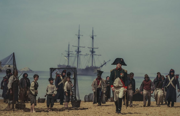 man with hat and ships in background in NAPOLEON
