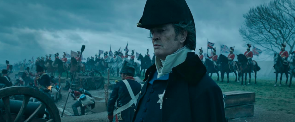 man with hat in foreground in NAPOLEON