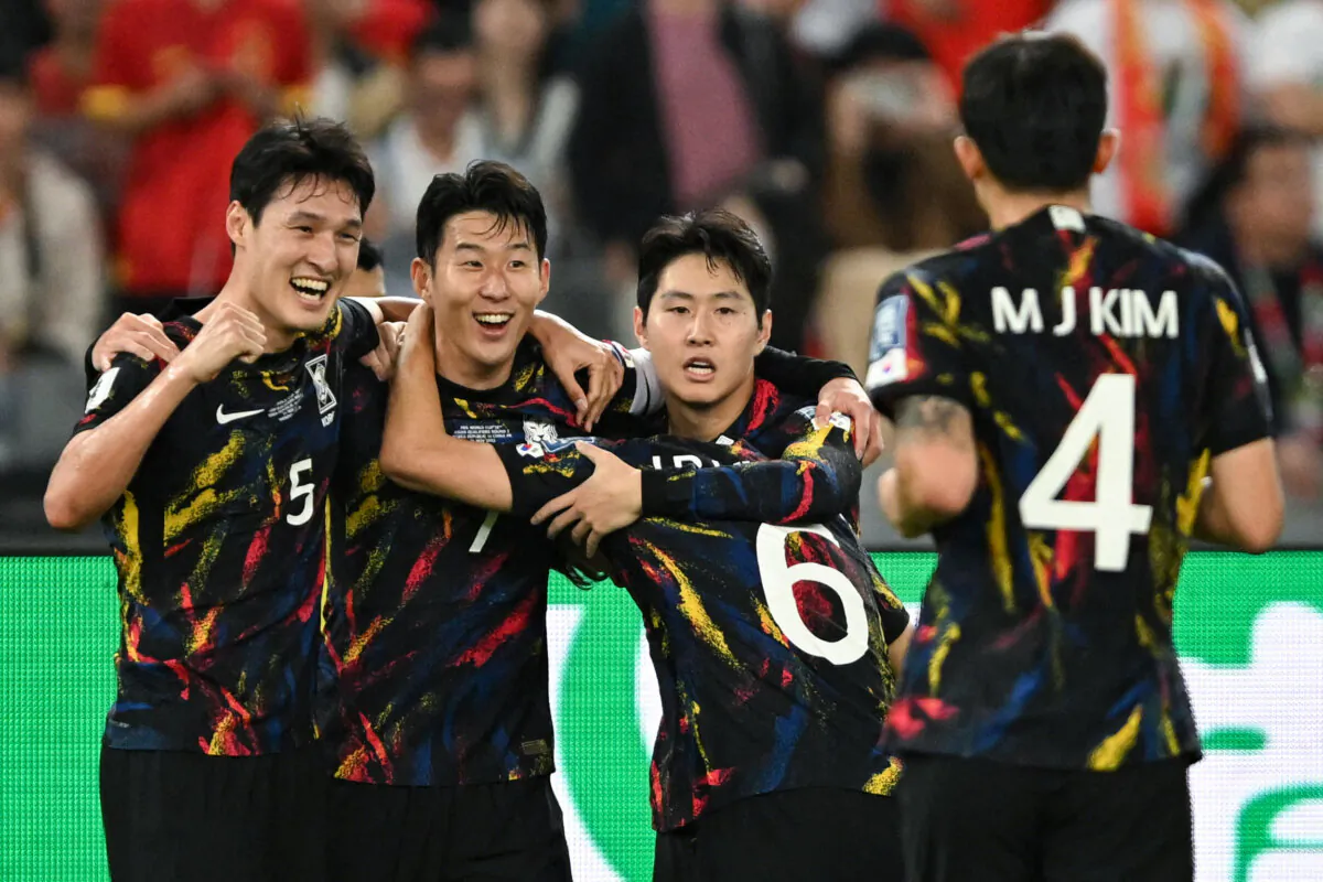 South Korea's Park Yong-woo (L), Son Heung-min (2L), Hwang In-beom (C), Lee Kang-in (2R), and Kim Min-jae (R) celebrate after scoring a goal during the 2026 FIFA World Cup AFC qualifiers football match between China and South Korea at Shenzhen, in China's southern Guangdong Province, on Nov. 21, 2023. (AFP via Getty Images)