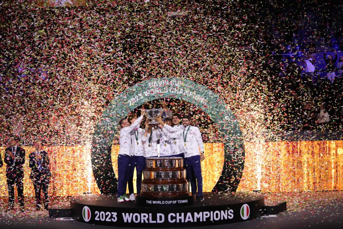 The Italian Davis Cup team celebrate with the trophy after defeating Australia during the Davis Cup final tennis matches in Malaga, Spain, on Nov. 26, 2023. (Manu Fernandez/AP Photo)