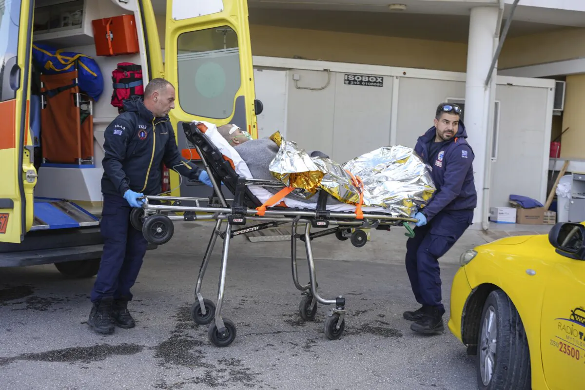 Paramedics transfer a survivor of a shipwreck at a hospital, on the northeastern Aegean Sea island of Lesbos, Greece, on Nov. 26, 2023. (Panagiotis Balaskas/AP Photo)