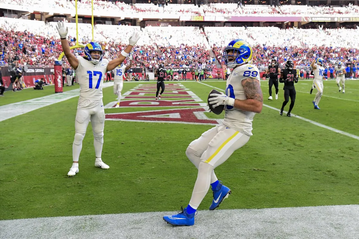 Puka Nacua (17) of the Los Angeles Rams reacts as Tyler Higbee (89) of the Los Angeles Rams scores a receiving touchdown during the first quarter against the Arizona Cardinals at State Farm Stadium in Glendale, Ariz., on Nov. 26, 2023. (Norm Hall/Getty Images)