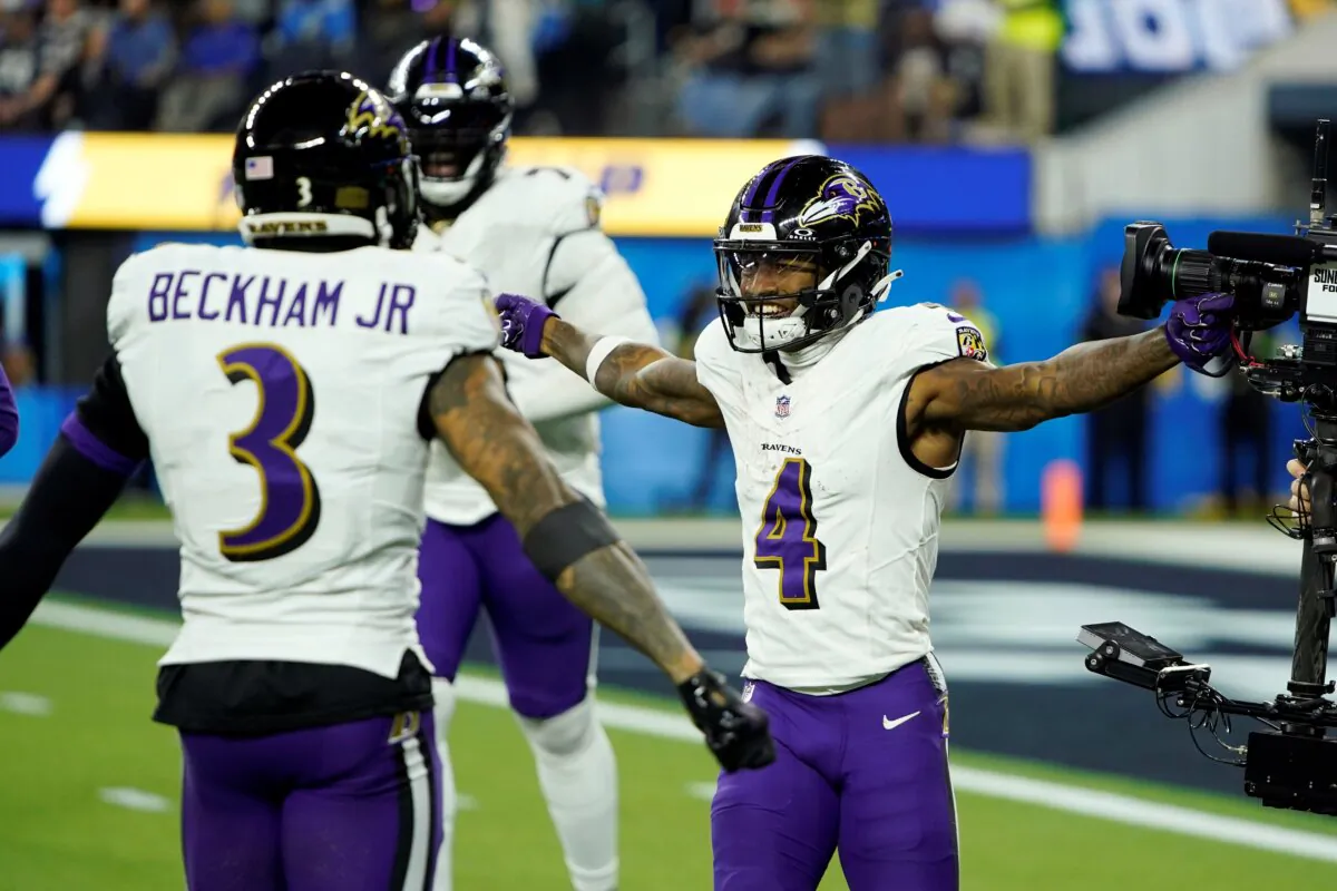 Baltimore Ravens wide receiver Zay Flowers (4) celebrates his touchdown run with wide receiver Odell Beckham Jr. (3) during the second half of an NFL football game in Inglewood, Calif., on Nov. 26, 2023. (Ryan Sun/AP Photo)