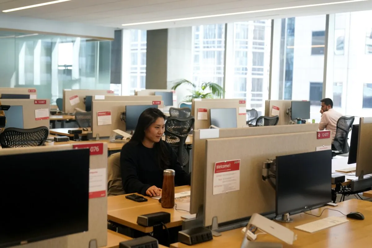 People work at the Yelp office in San Francisco on Feb. 14, 2023. (Jeff Chiu/AP Photo)