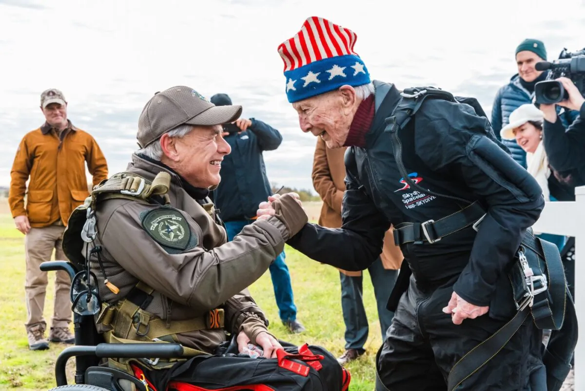 Texas Gov. Greg Abbott (L) and 106-year-old World War II veteran Al Blaschke skydived at Skydive Spaceland San Marcos in Fentress, Texas, on Nov. 27, 2023.
(Courtesy of the Office of Greg Abbott)