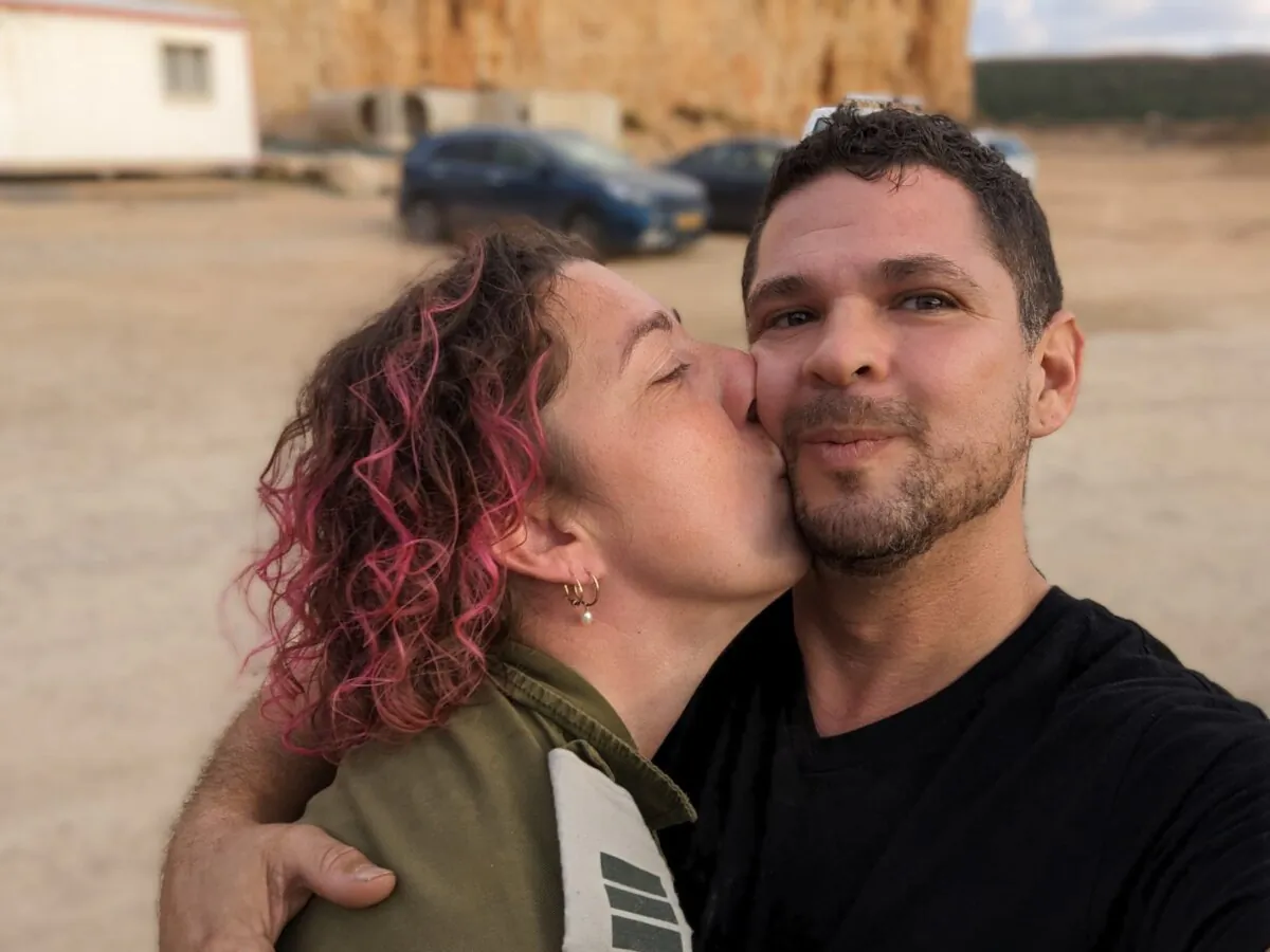 Danit Silber (L) with her husband Yishai, who's holding down the home front while she serves in the IDF near the Lebanese border. (Courtesy of Danit Silber.)