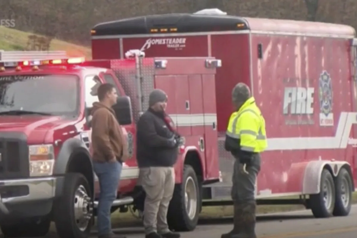 Emergency responders work at the scene of a derailment of a CSX train north of Livingston, Ky., on Nov. 22, 2023. (WTVQ via AP Photo)