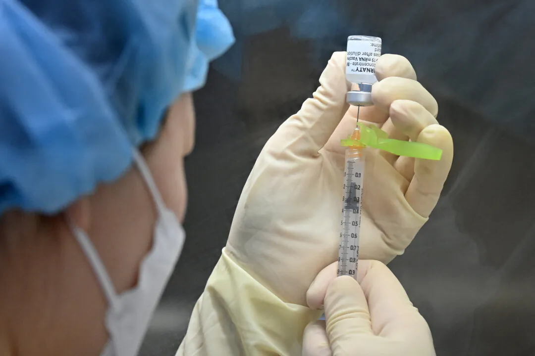 A nurse prepares a COVID-19 vaccine in Seoul, South Korea, on March 20, 2021. (Jung Yeon-Je/Pool/AFP via Getty Images)