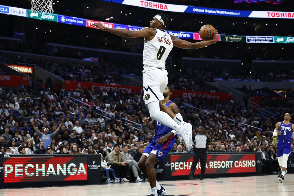 Peyton Watson (8) of the Denver Nuggets takes a shot against the LA Clippers in the second half in Los Angeles on Nov. 27, 2023.  (Ronald Martinez/Getty Images)