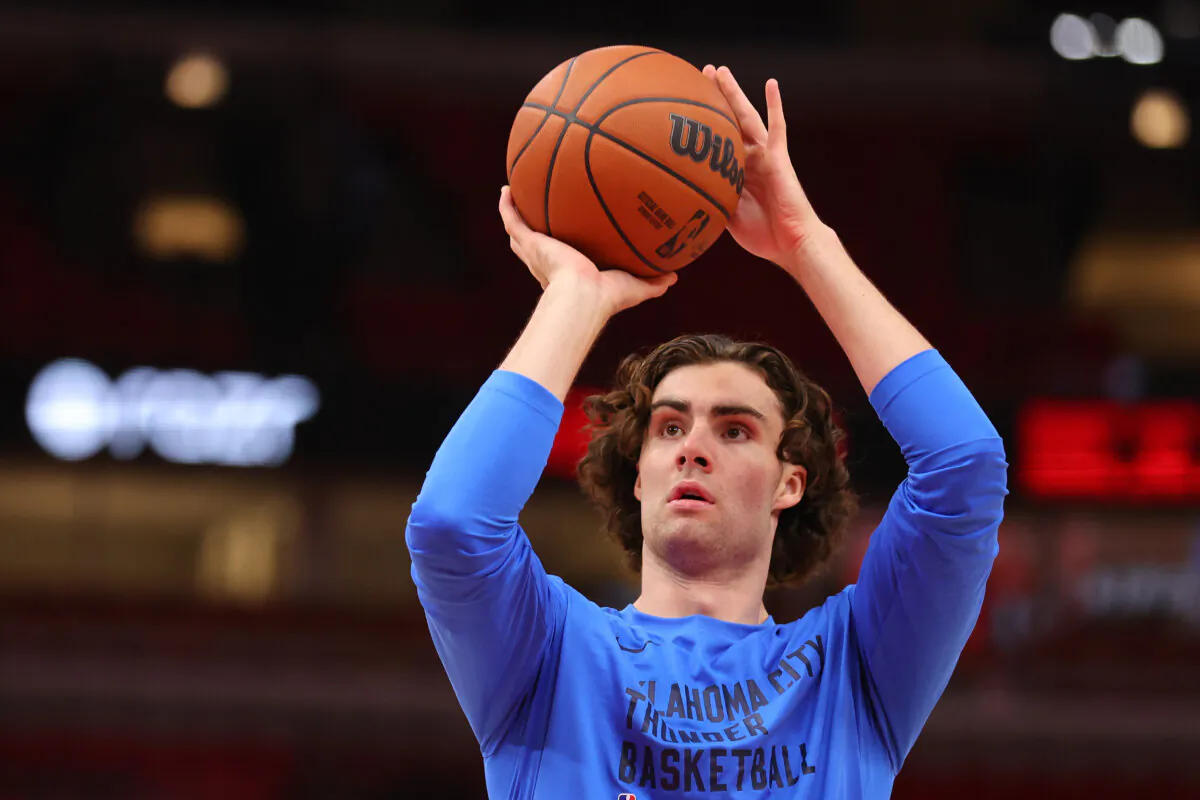 Josh Giddey #3 of the Oklahoma City Thunder warms up prior to the game against the Chicago Bulls at the United Center in Chicago, Illinois on October 25, 2023. (Michael Reaves/Getty Images)
