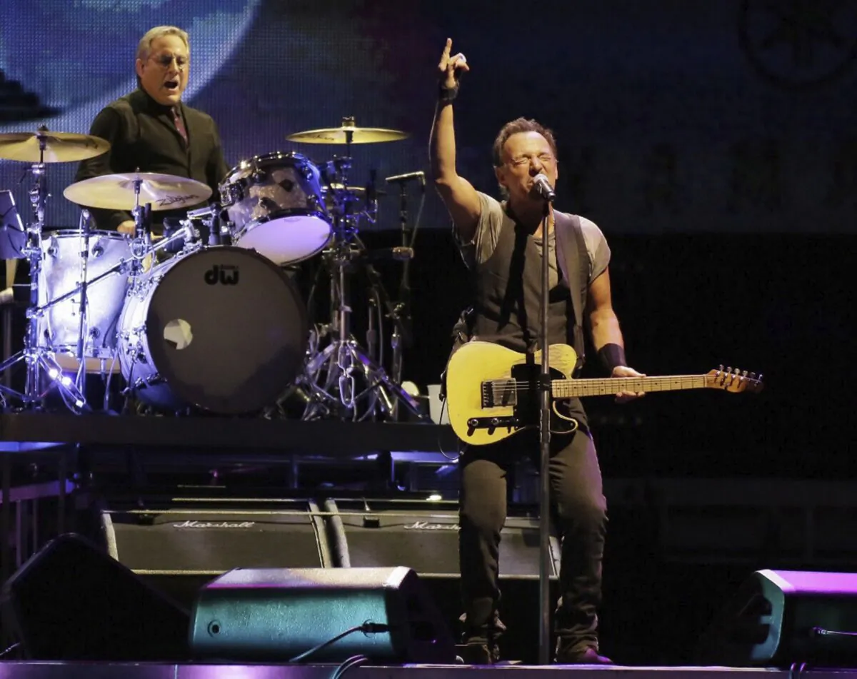 Max Weinberg plays the drums (L) while Bruce Springsteen and the E Street Band perform during The River Tour in Philadelphia on Sept. 7, 2016. (Elizabeth Robertson/Philadelphia Inquirer via AP)