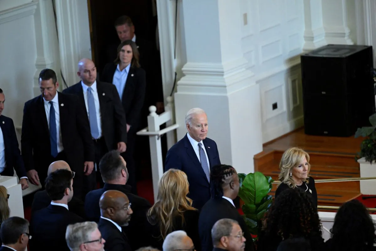 President Joe Biden and First Lady Jill Biden arrive at a tribute service for former first lady Rosalynn Carter at Glenn Memorial Church in Atlanta, Georgia, on Nov. 28, 2023. (Andrew Caballero-Reynolds/AFP via Getty Images)