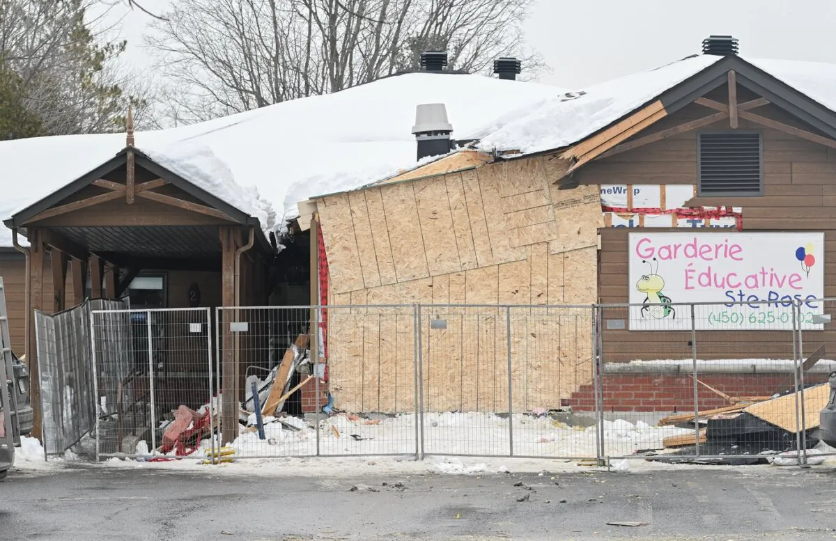 The scene outside a daycare centre in Laval, Que. is shown after a bus crashed into the building, killing two children, on Feb.9, 2023. (The Canadian Press/Graham Hughes)